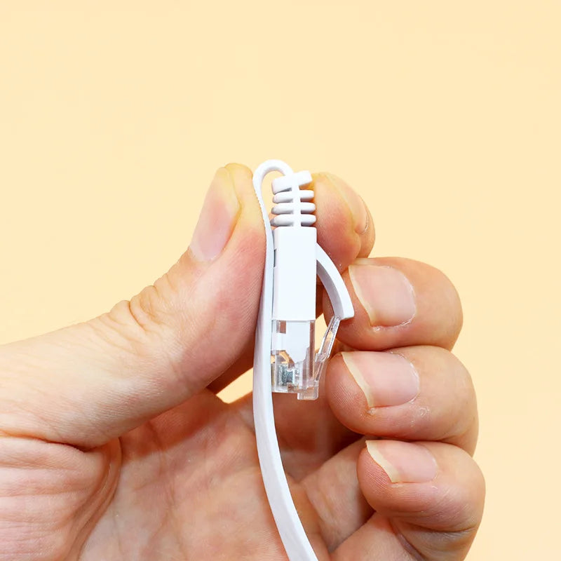 CAT6 Flat Ethernet Patch Cable – connected to router