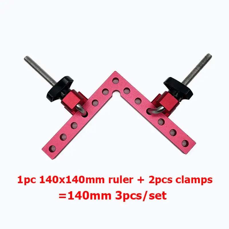 Pink L-shaped angle clamp with holes and black clamps for precise woodworking joints