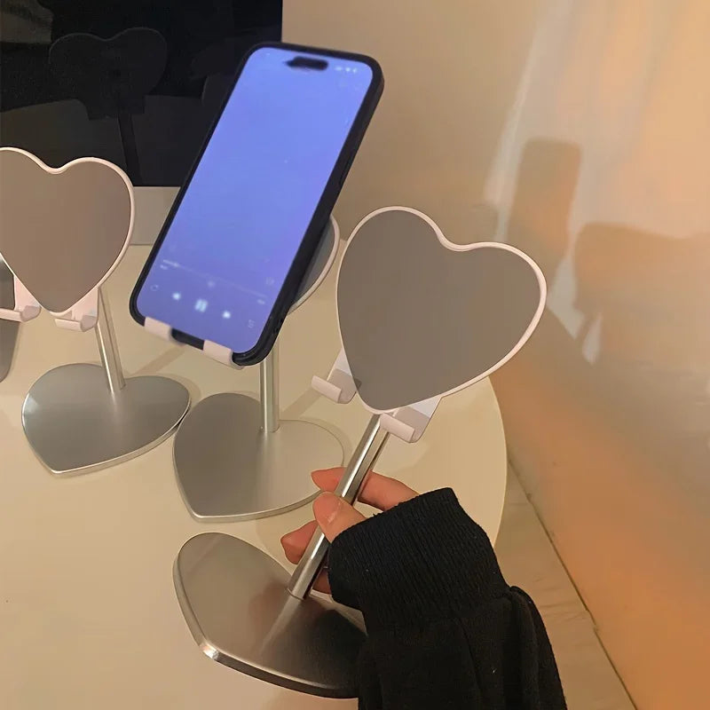 Retractable Phone & Tablet Stand – holding phone angled