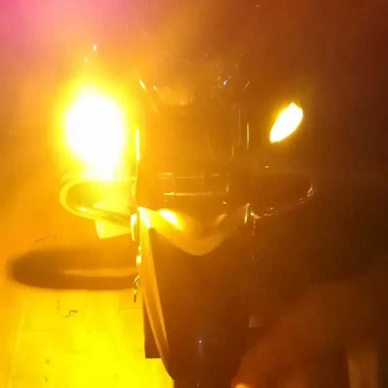 AMSYD BA15S Turn Signal showcasing illuminated headlight with bright yellow glow for safety