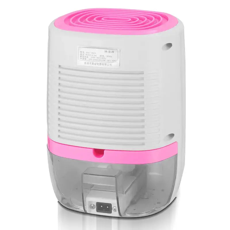 Compact electric mini air dehumidifier for small spaces with white body and pink top