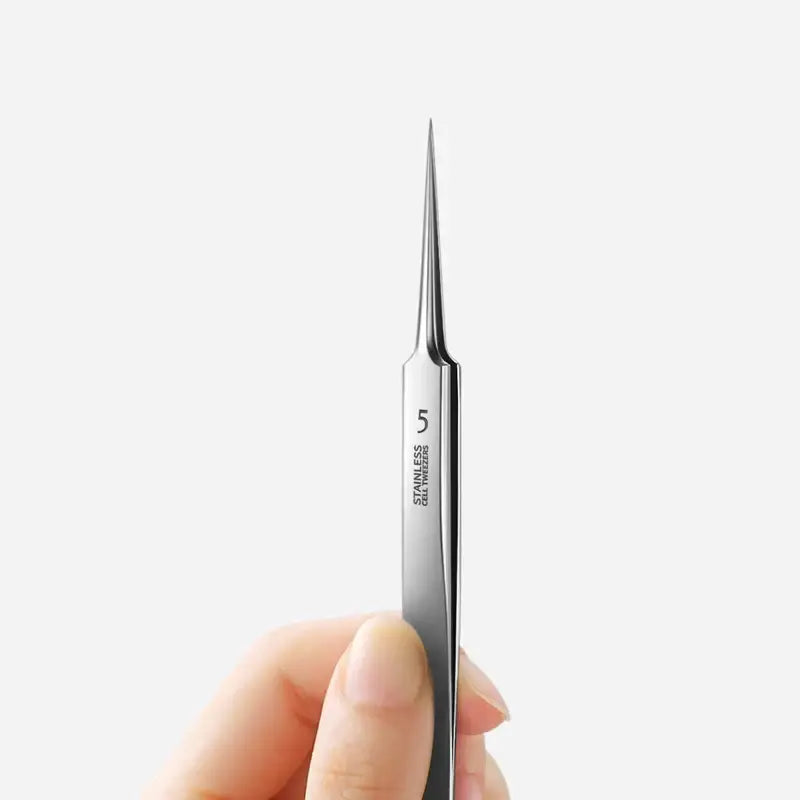 Precision tweezers held between fingers for Fbiannely Stainless Steel skin care tool