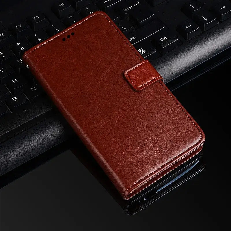 Brown leather wallet-style flip case for Samsung Galaxy S23 Ultra with clasp closure