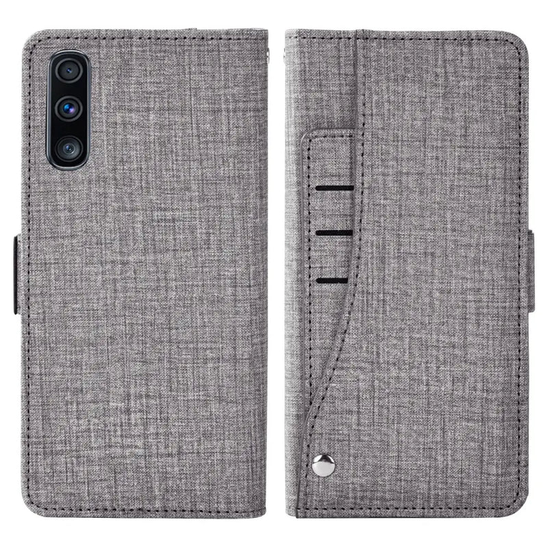 Gray fabric-textured wallet phone case featuring card slots and a lanyard wrist strap