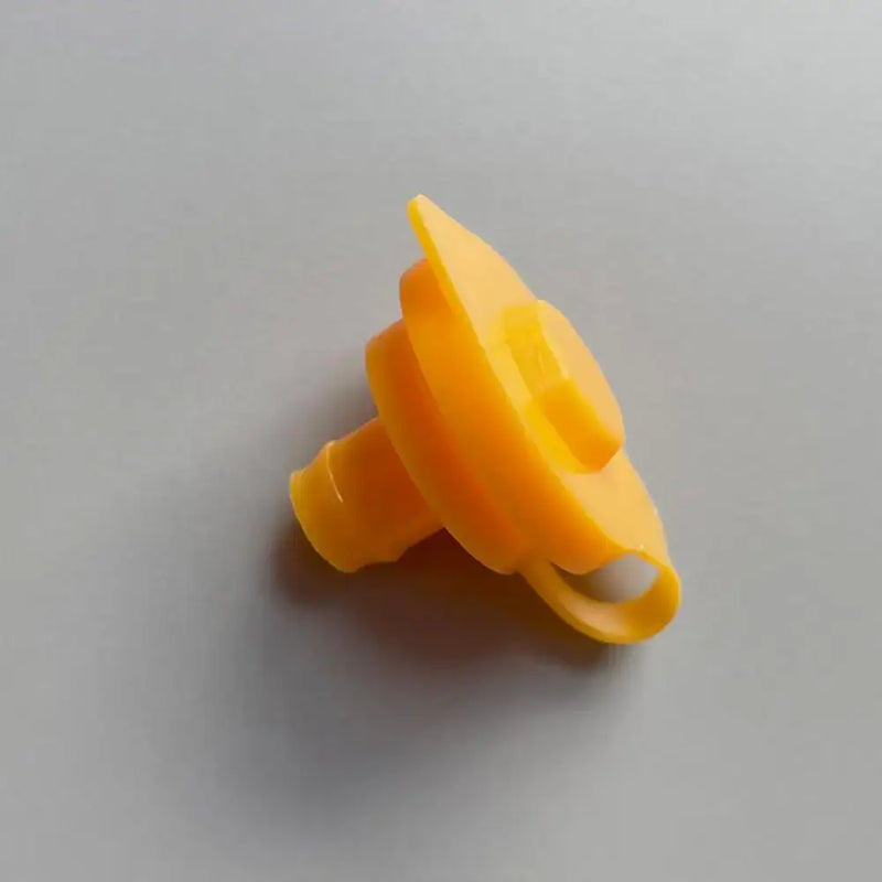 Yellow plastic Lego piece with a conical shape for hexagonal nut maintenance tools