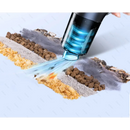 Handheld car vacuum with blue light efficiently cleaning pet food from various surfaces