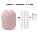 Pink HAOYUNMA Compact Humidifier with green accent line and efficient mist discharge power