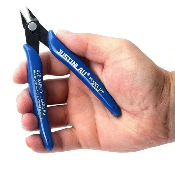 Blue-handled wire cutters held in hand, part of Justinlau Metalworking Tool for stainless steel