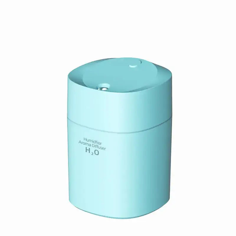 Cylindrical light blue Kemei energy-efficient USB air humidifier with rounded top design