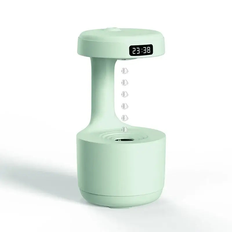 Mint green Kemei Energy-Efficient USB Air Humidifier with digital display and cylindrical base