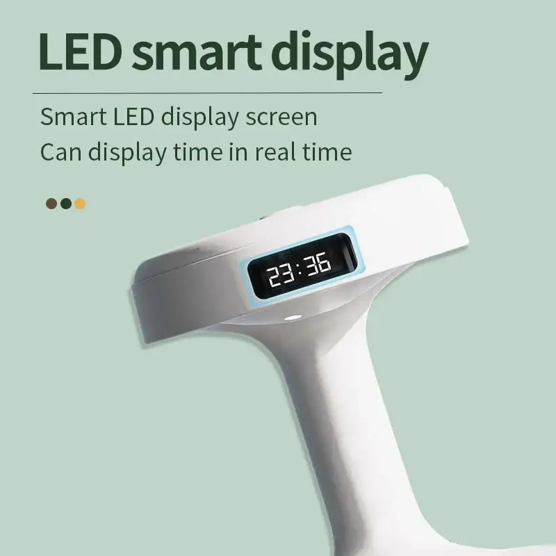 Handheld device with LED display showing time on Kemei Energy-Efficient USB Air Humidifier