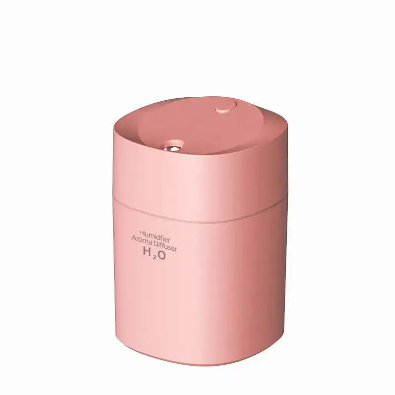 Pink cylindrical humidifier with rounded top in Kemei Energy-Efficient USB Air design