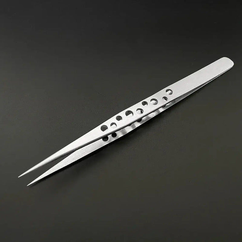 Stainless steel Lefavor Industrial Tweezers with circular cutouts for precision tasks