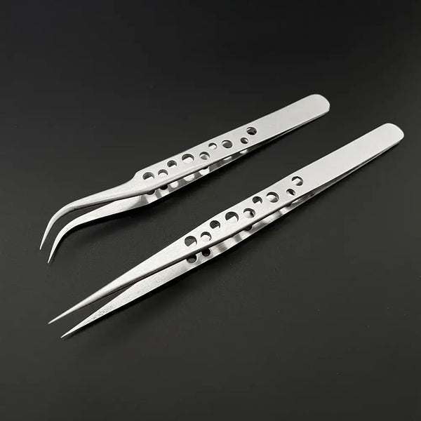 Pair of Lefavor Industrial Tweezers with perforated handles for precision tasks in electronics