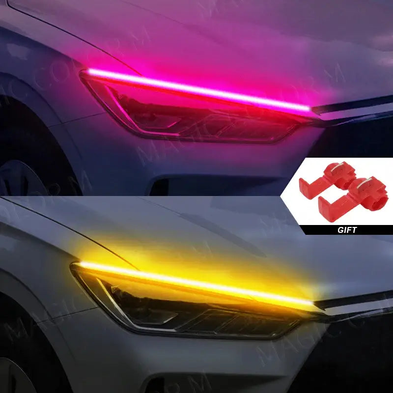 Car headlights featuring Magic Colorm Guide Light with pink and yellow LED strips