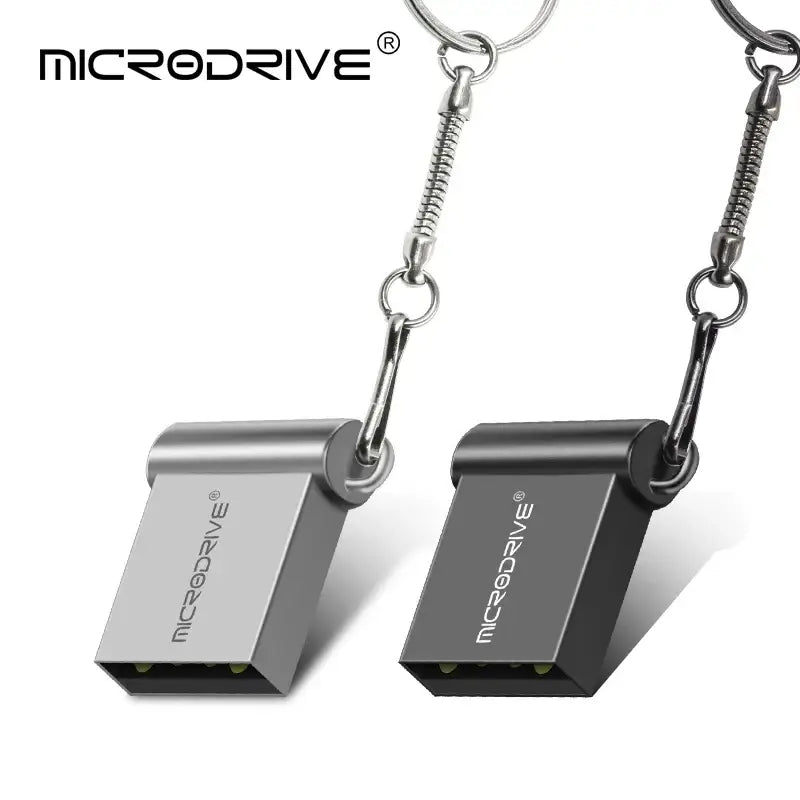 Compact MicroDrive MG016G1105 Flash Disk in silver and black with keychain attachments