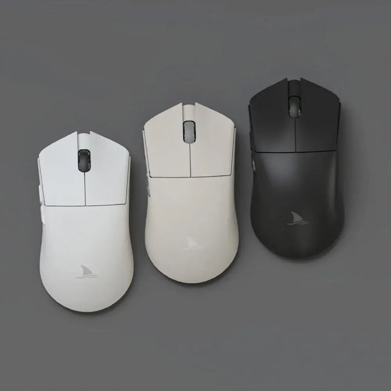 Three Motospeed Darmoshark M3 Bluetooth Wireless Gaming Mice in white, off-white, and black