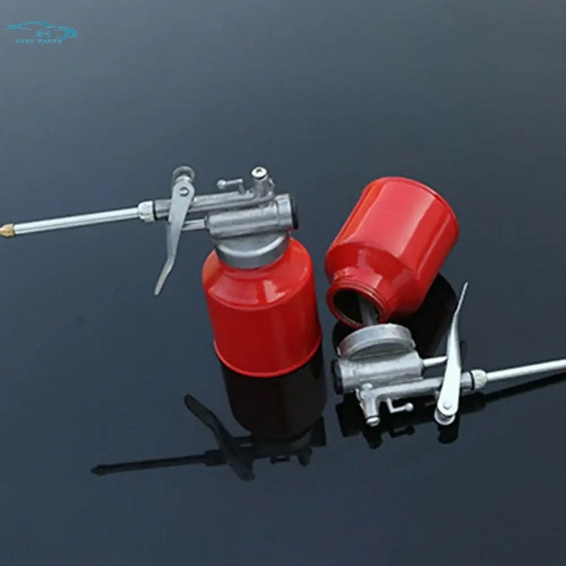 Red oil can with die cast body and metal spout for 250ml oil applications