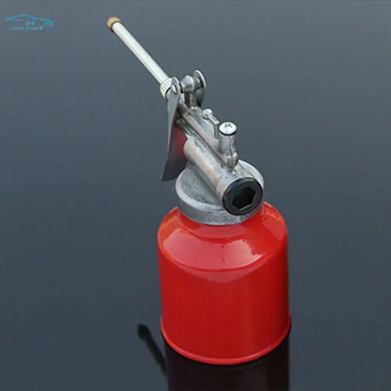 Red die cast oil can with long metal spout for 250ml oil applications