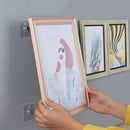 Framed abstract portrait showcased with NoEnName Null DIY supplies and picture hangers