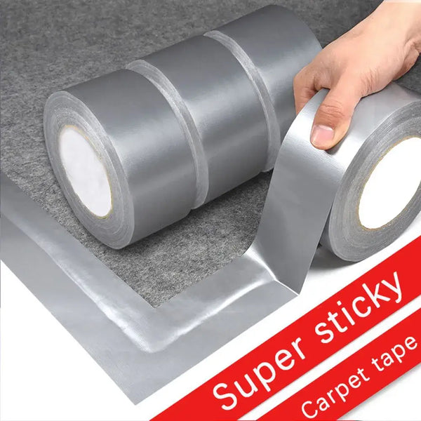 Silver duct tape rolls with a hand peeling off a strip of Null DIY Plumbing Tape