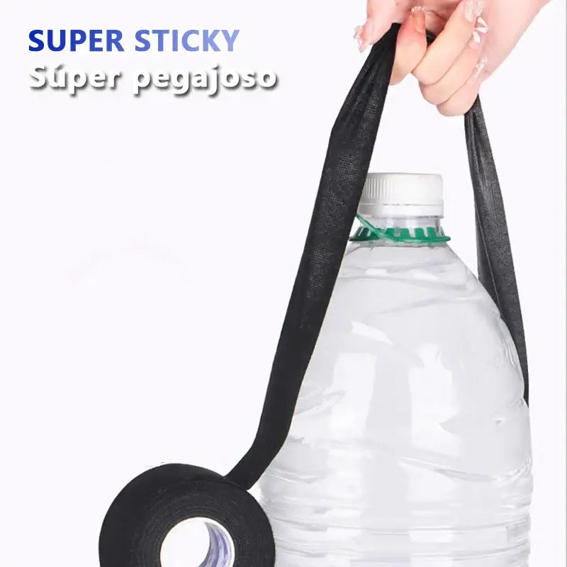 Black adhesive electrical tape lifting a plastic water bottle for insulation