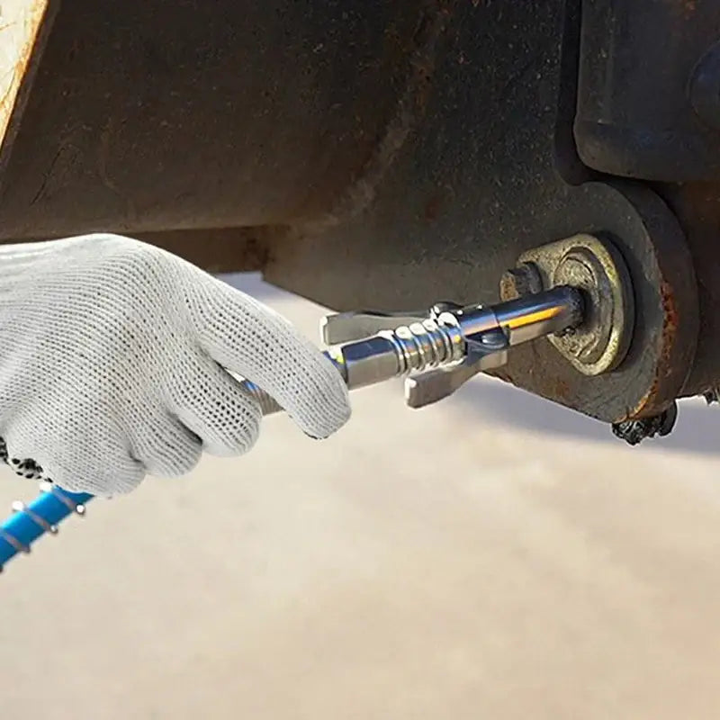 Pneumatic impact wrench applying NoEnName Null for lug nut removal on a vehicle