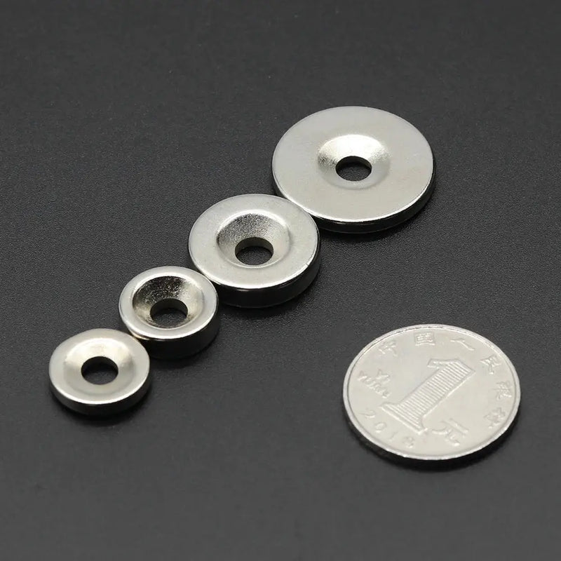 Metal washers of various sizes with holes for Neodymium Magnet in industrial applications