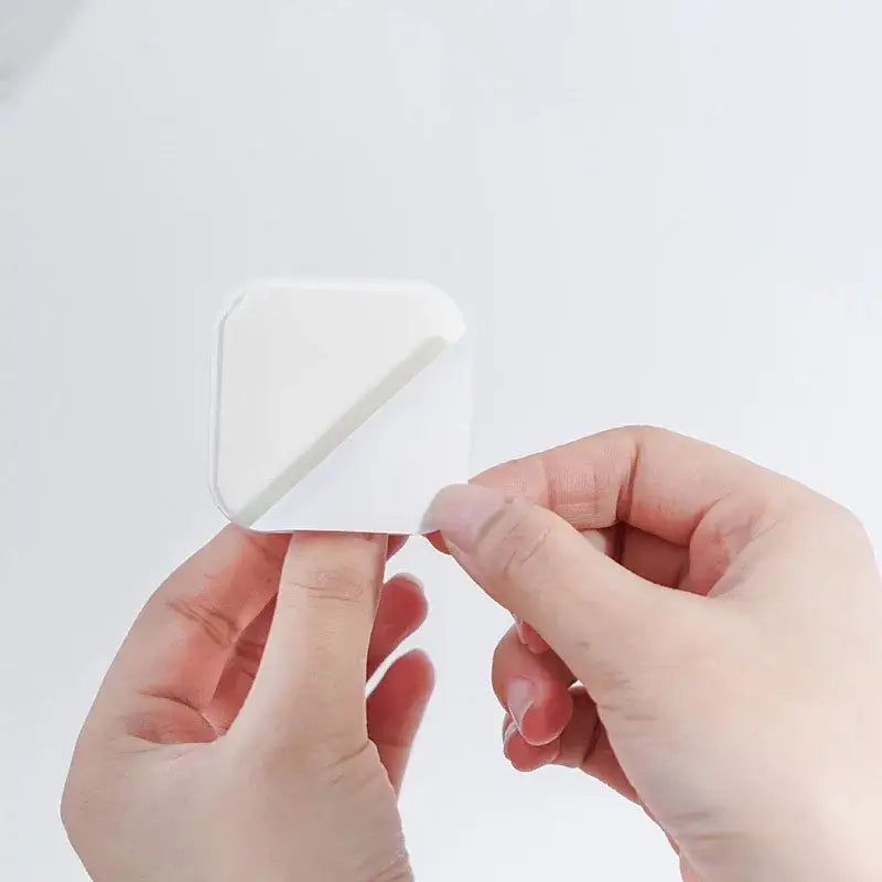 White adhesive bandage being peeled open, ideal for NoEnName Null Origin Household Product