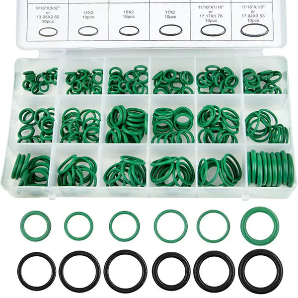 Assortment of green and black rubber o-rings in organizer case for origin ring gasket