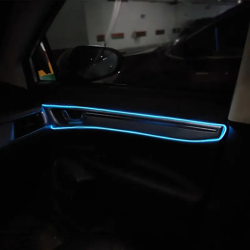 Illuminated blue dashboard trim with NoEnName Null Soft Glue Atmosphere Lamp in vehicle