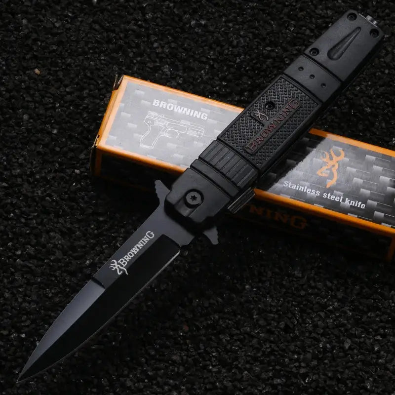 Black tactical folding knife with textured handle and partially serrated blade for NoEnName_Null DIY