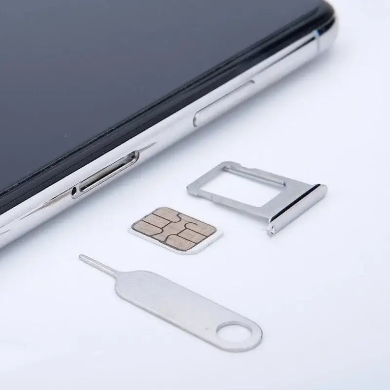 Smartphone with SIM card, SIM card tray, and ejector tool for NoEnName_Null