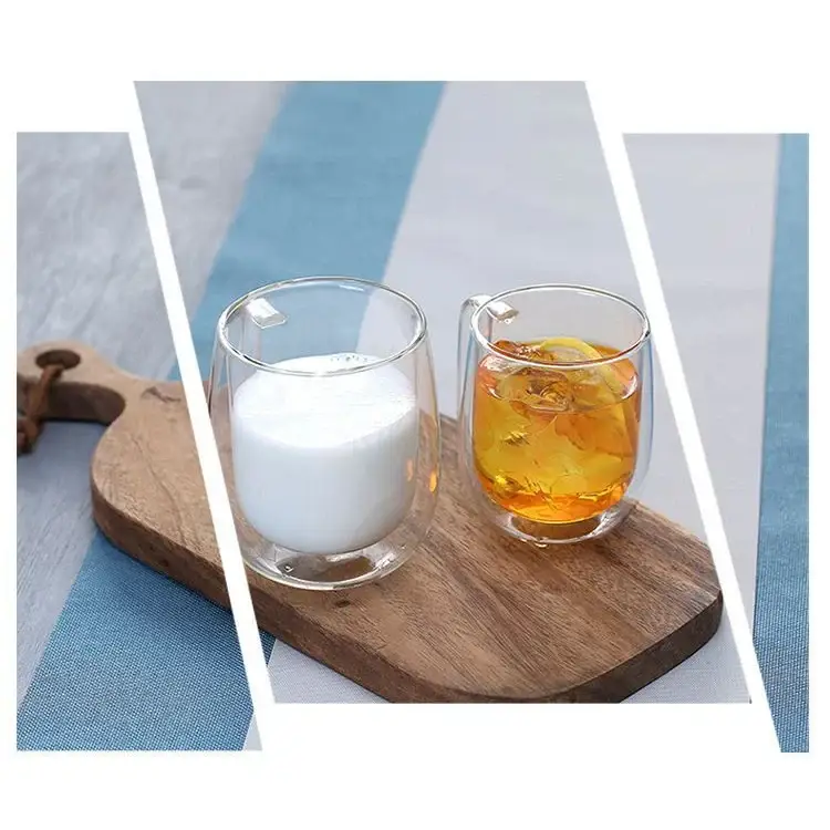 Two double wall glass cups on a wooden board, one with milk and the other with ice