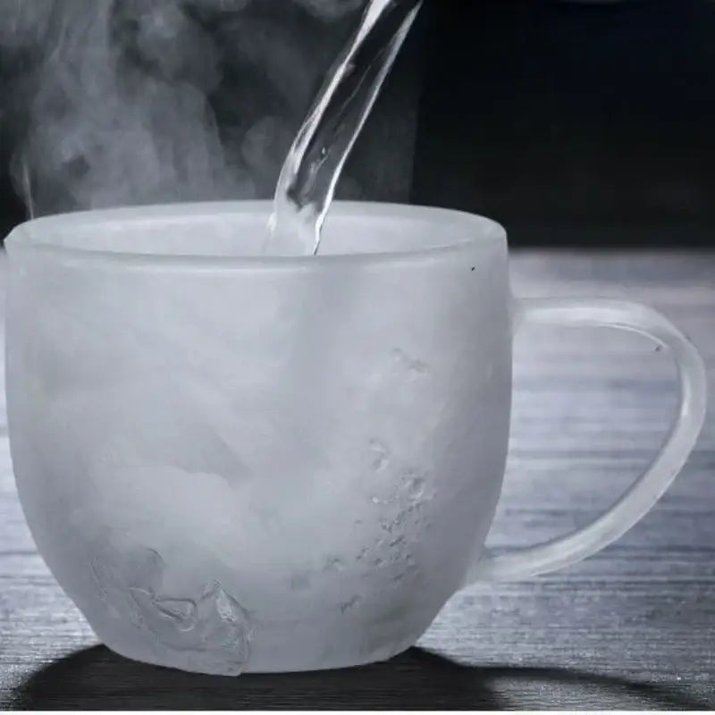 Steaming mug of hot liquid poured into NoEnName_Null Transparent Double Wall Glass Cup