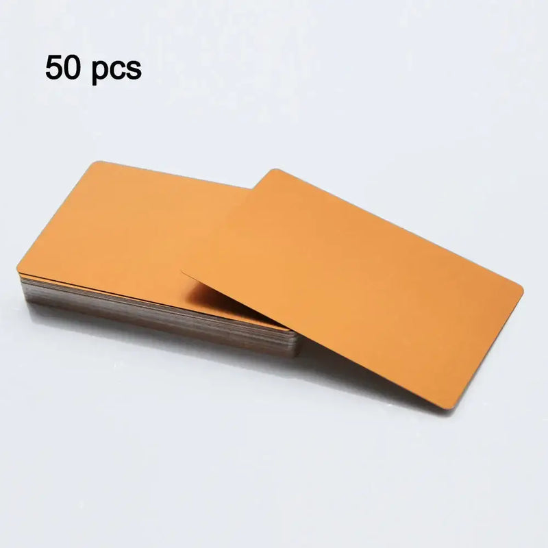 Stack of orange rectangular metal cards for NoEnName Null Type Hand Tool Parts 86mm x 54mm