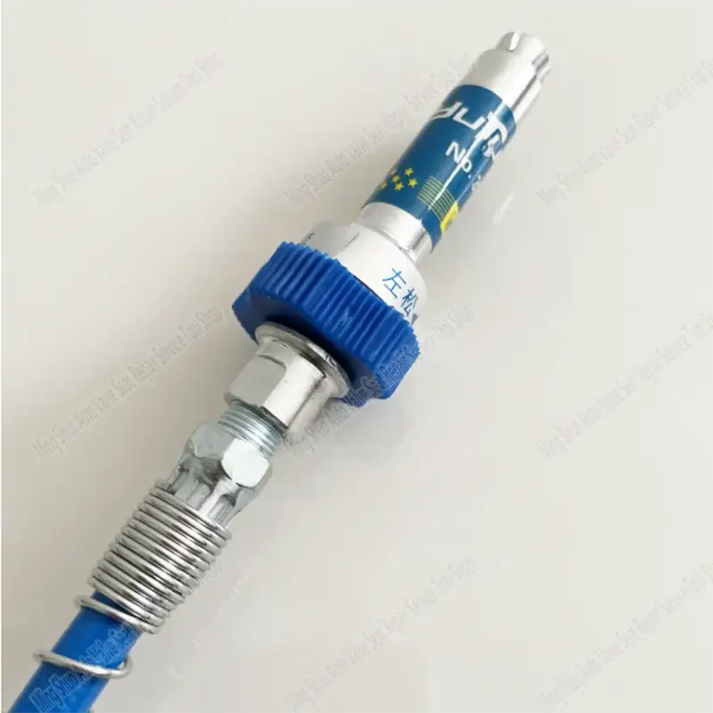 Spark plug featuring a blue and white body for Quick Locking Pliers and M10 Grease Connectors