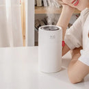 White Sokany Portable Humidifier with 2000mAh Battery emitting steam on a table