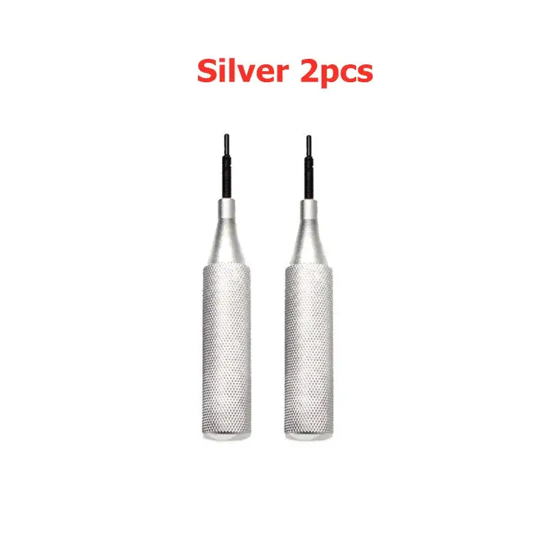 Two silver ECU cover open tools with textured grips and thin black tips for vehicle maintenance