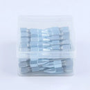 Clear plastic container with light blue electrical wire connectors for Needle Grease Gun