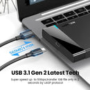 USB cable connected to a laptop showcasing UGREEN HDD Case for fast data transfer speeds