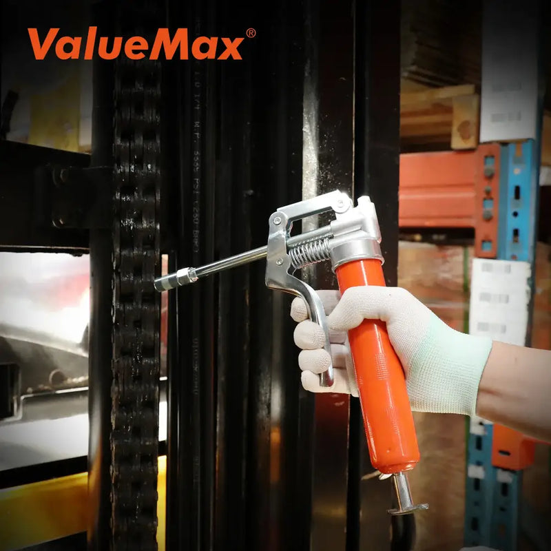 Air blow gun with orange handle in use with ValueMax WORKPRO Grease Gun V114001A