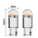 Cylindrical W5W LED T10 car light pods with transparent tops and metallic bases