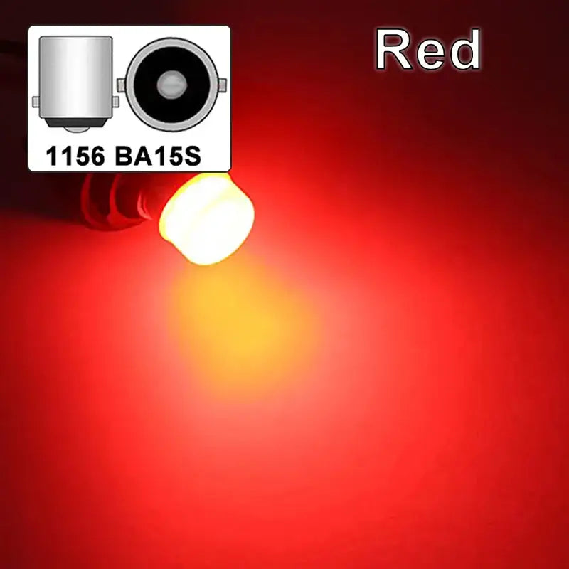 Red illuminated LED Bulb P21W BA15S emitting a bright glow for applicable cars