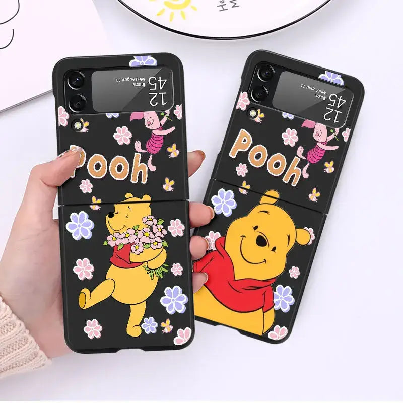 Two Winnie the Pooh Bear smartphone cases featuring Pooh Bear and Tigger designs