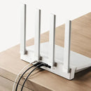 White Xiaomi AX3000T Router featuring four antennas and multiple cable ports for stability