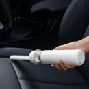 Xiaomi Handheld Mini Function Vacuum being used to clean car interior efficiently