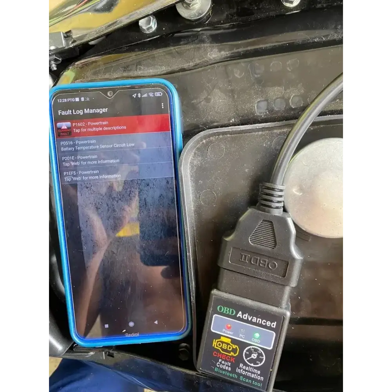 Smartphone showing Fault Log Manager next to Yamaha Honda Suzuki EFI Motobike OBD2 cable tool